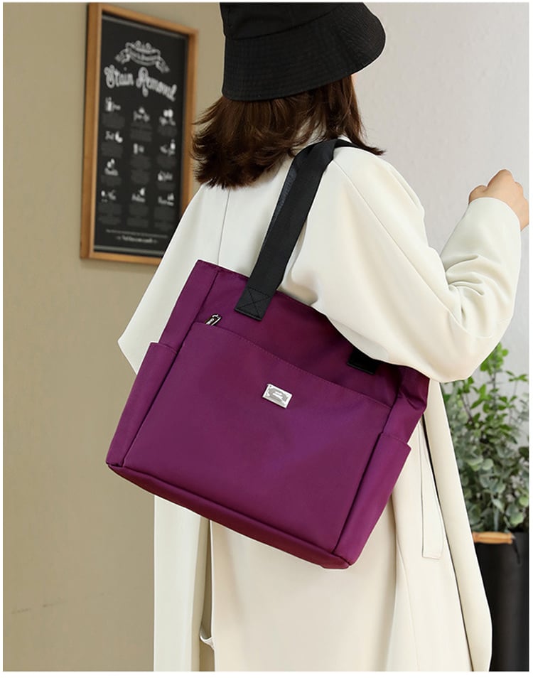 🔥Vízálló nylon válltáska nagy kapacitással és több zsebbel👜